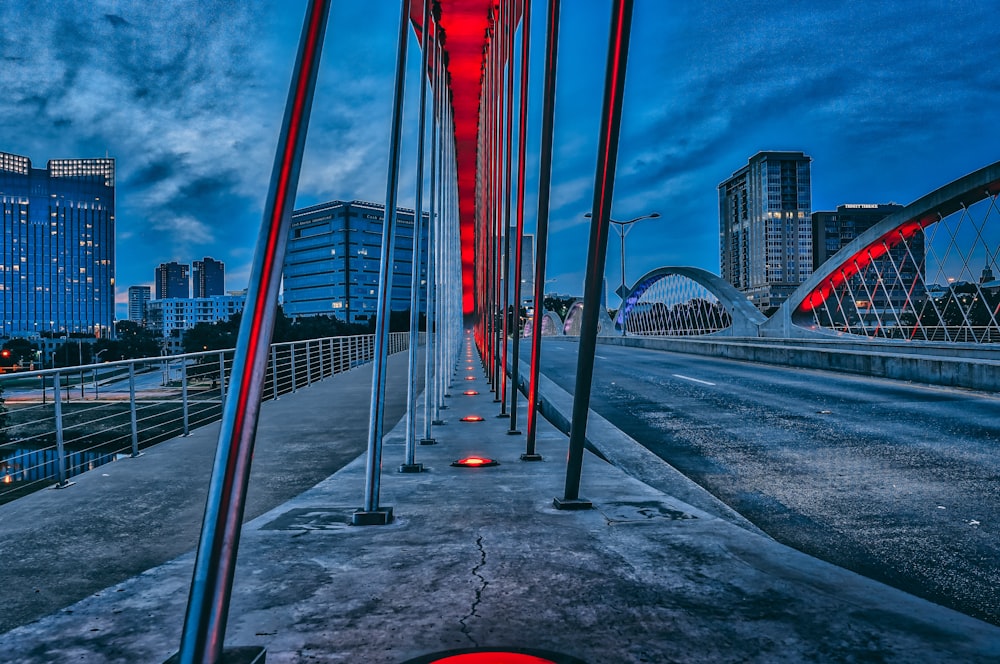 bridge with red lights during nighttime