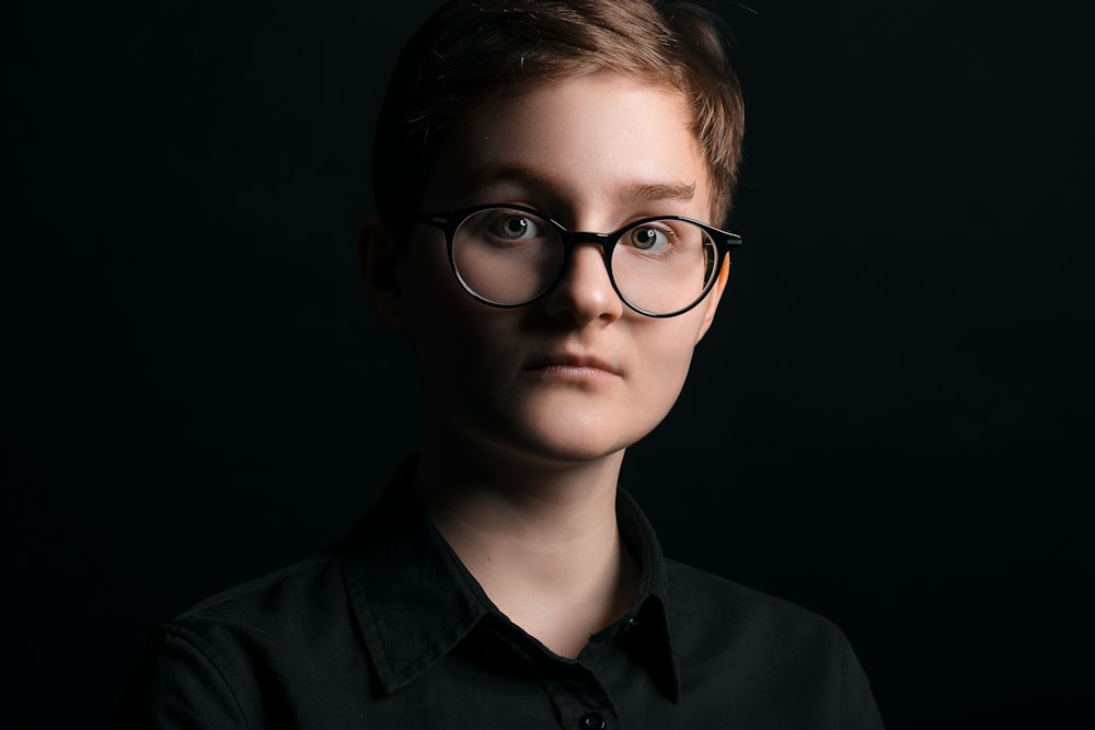 portrait photo of woman wearing eyeglasses