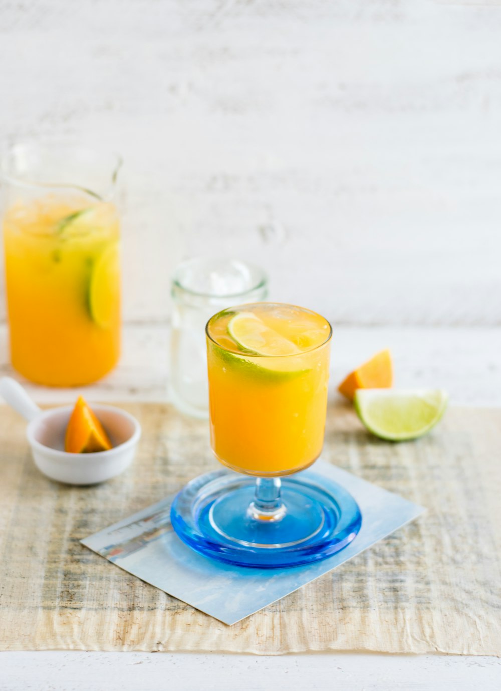 clear glass footed cup filled with liquid