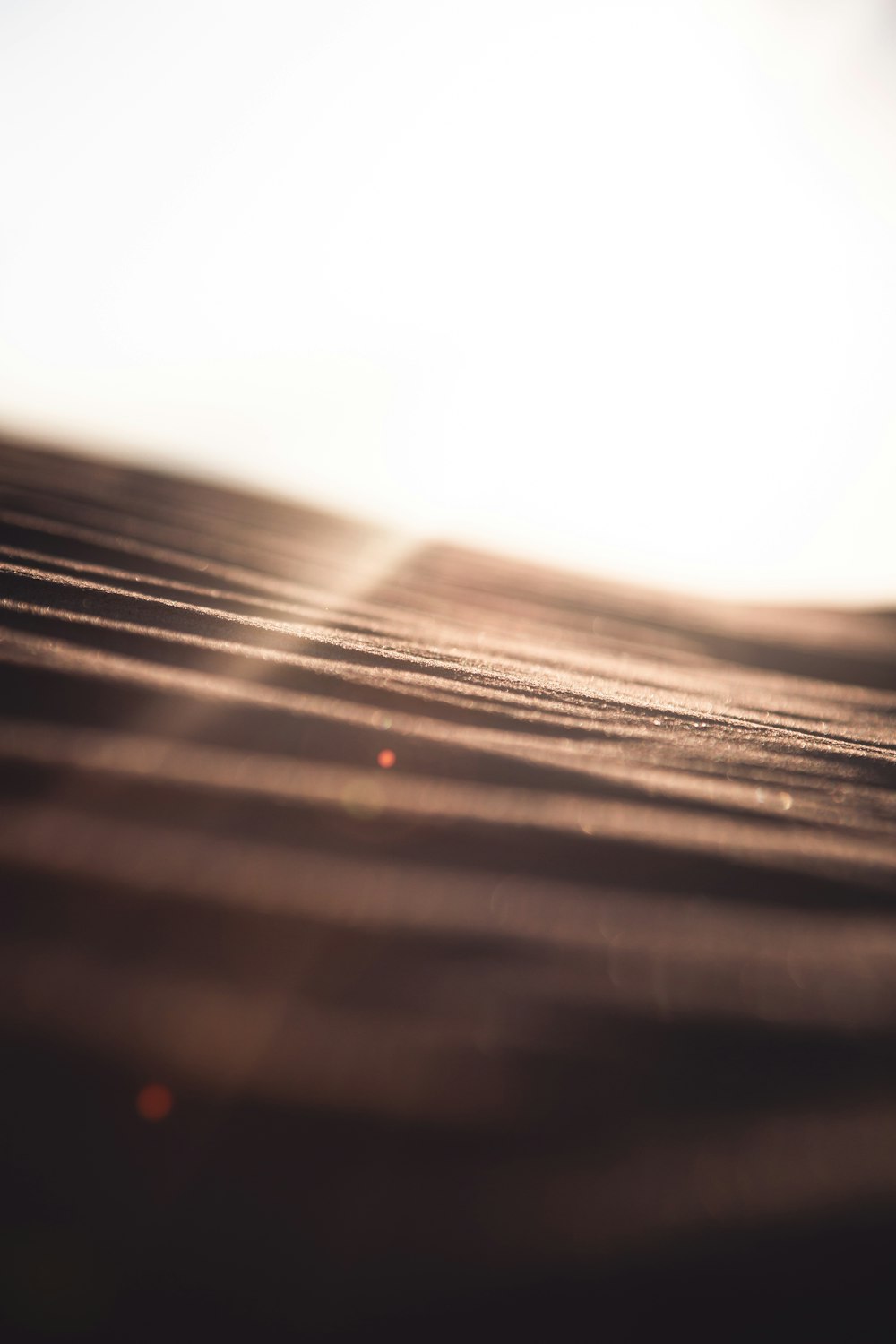 a blurry photo of a wooden surface