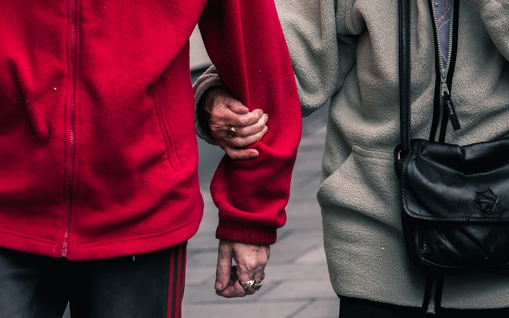 person wearing red jacket