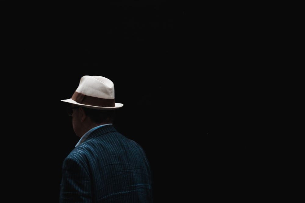 man wearing white fedora hat