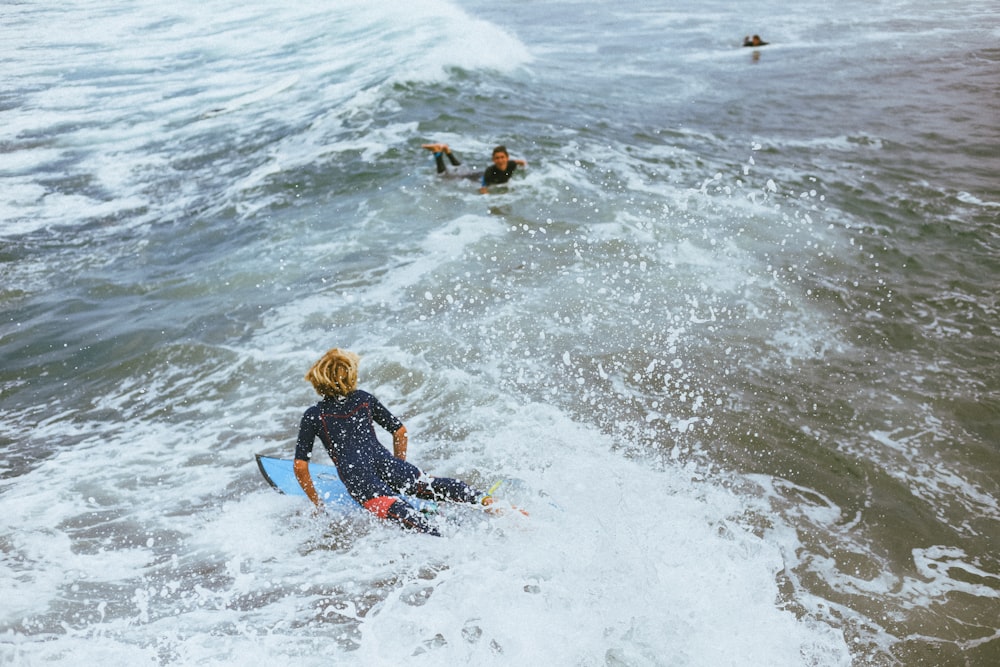 person surfing during day time