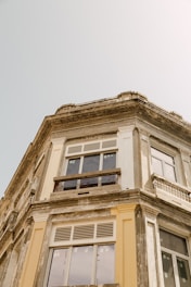 brown building under gray sky during daytime