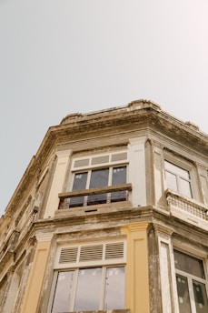 brown building under gray sky during daytime
