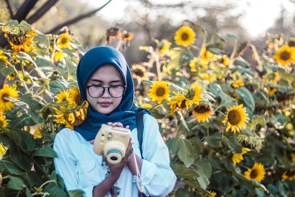 woman holding camera