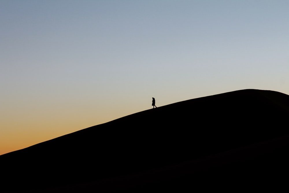 person standing on cliff