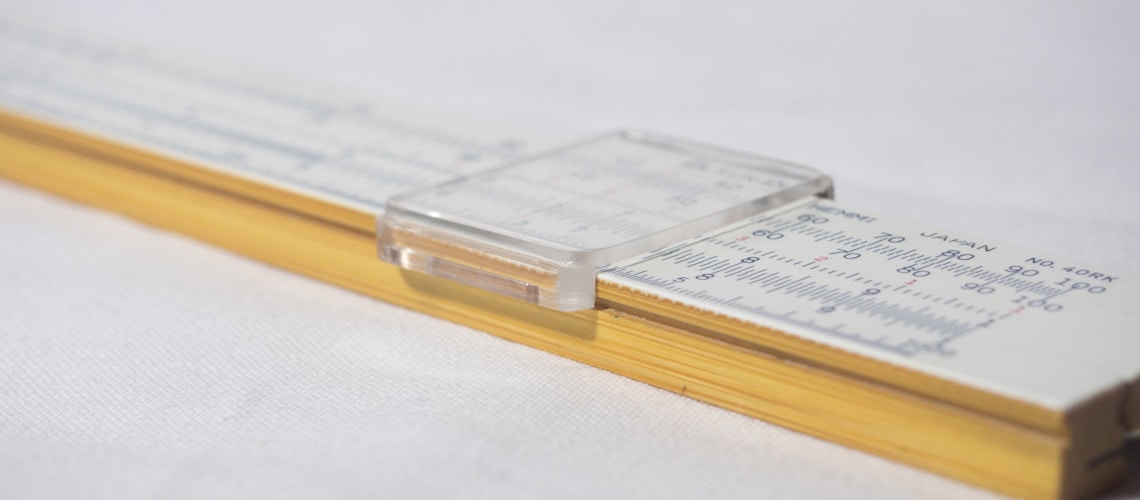 brown and white measuring ruler