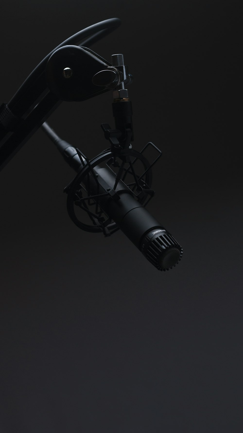 black microphone in dimmed room