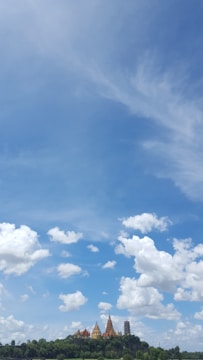 A serene blue sky above an ancient temple, symbolizing divine revelation.