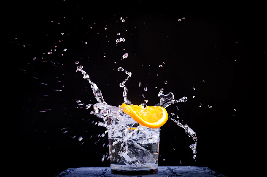A glass of water with a slice of lemon