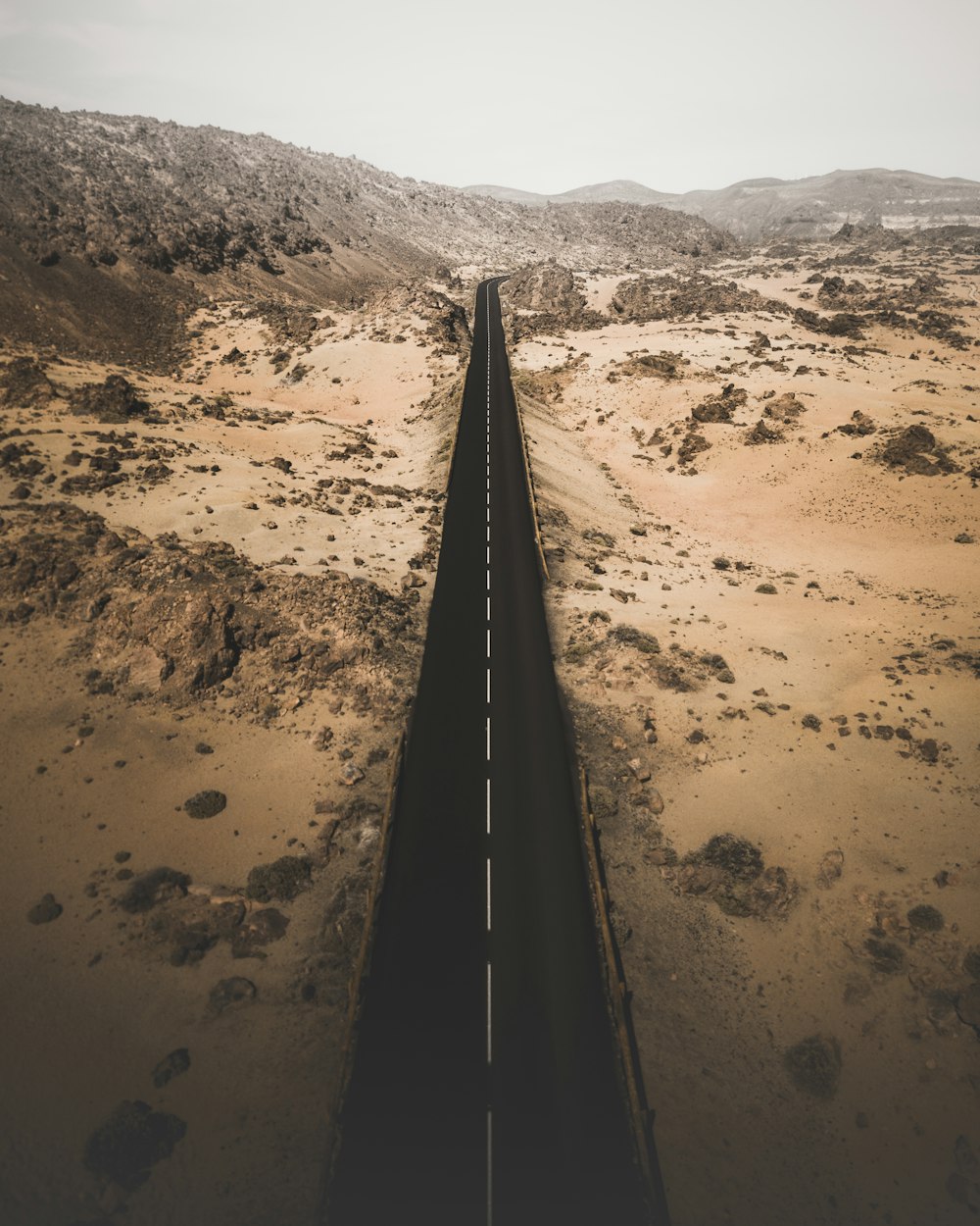 aerial photography of road near mountain