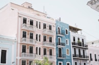 photo of blue and pink painted high-rise building