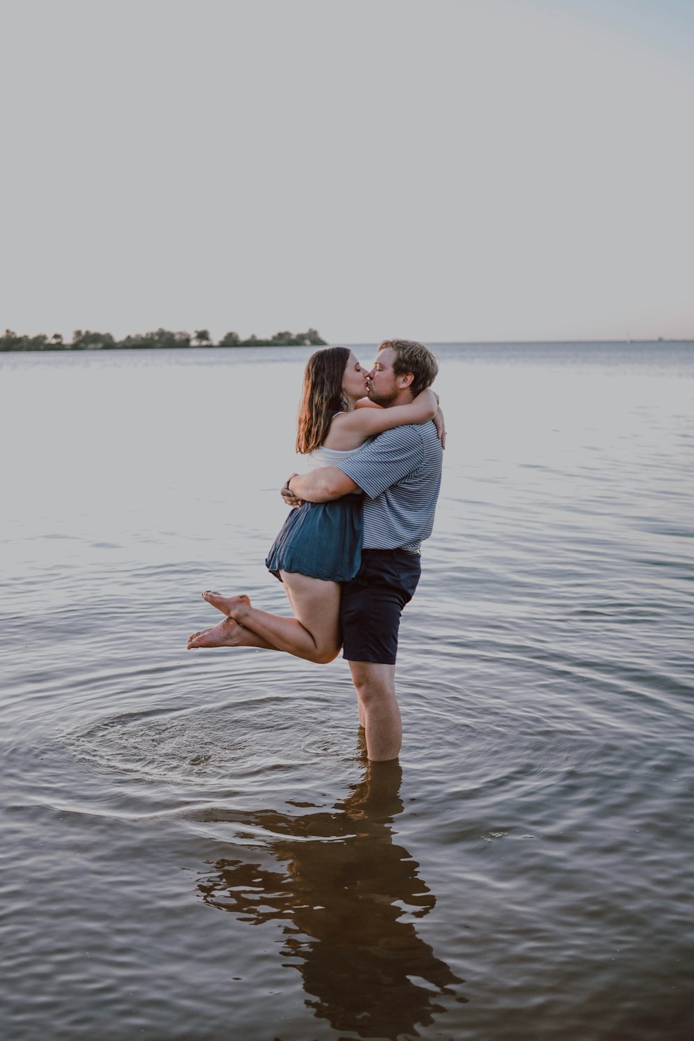 man hugging his wife