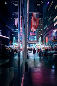 people walking in front of buildings