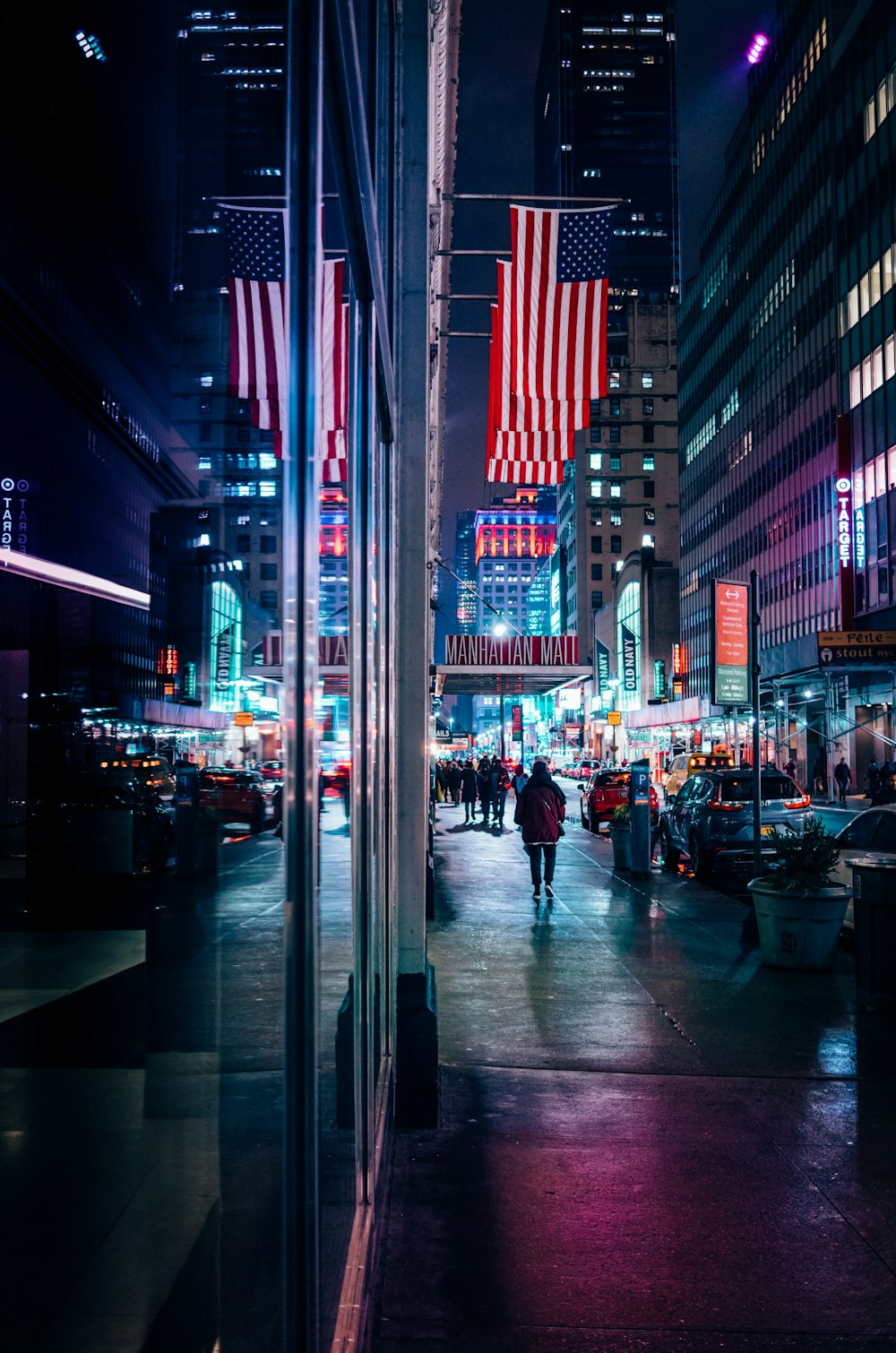 people walking in front of buildings