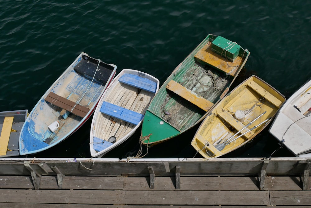 five parked motor boats