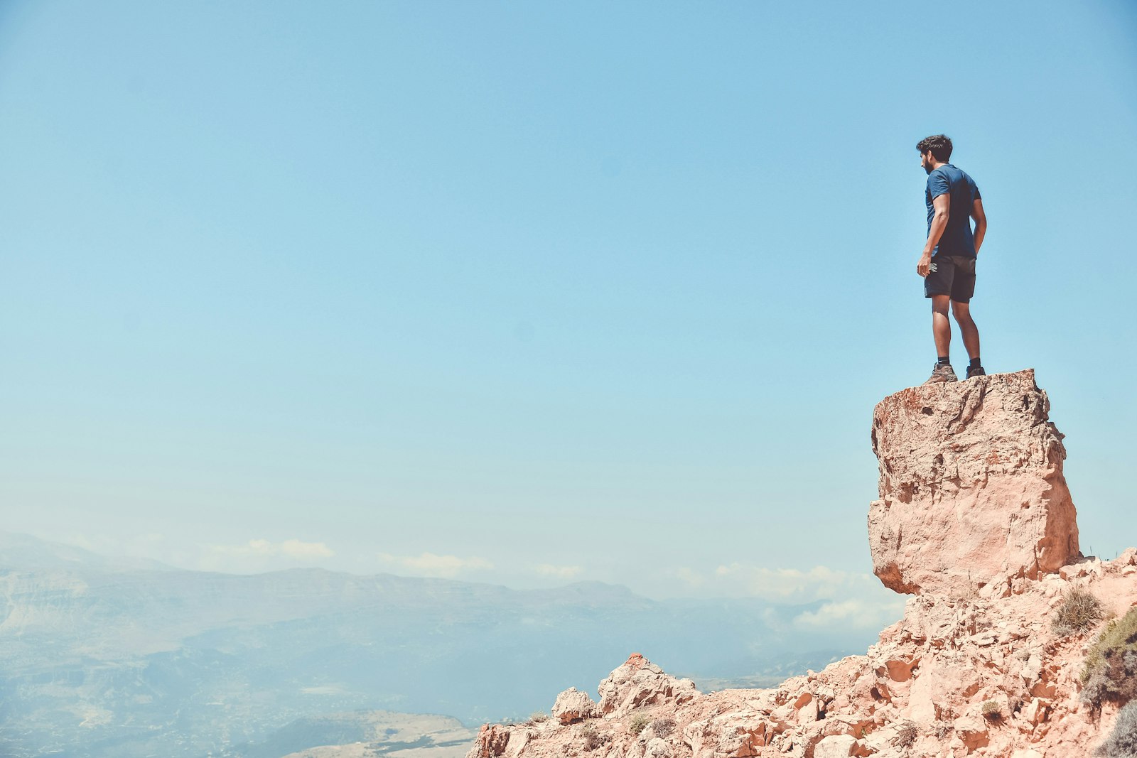 Nikon D610 + Nikon AF-S Nikkor 24-120mm F4G ED VR sample photo. Man standing on rock photography