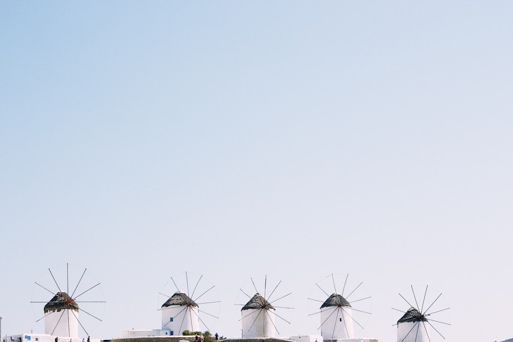 wind mills under blue sky