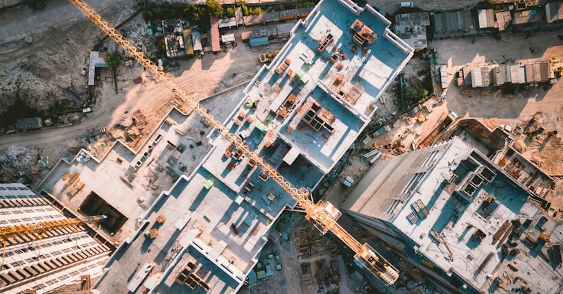 aerial view photography of vehicles and buildings during daytime