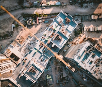 aerial view photography of vehicles and buildings during daytime