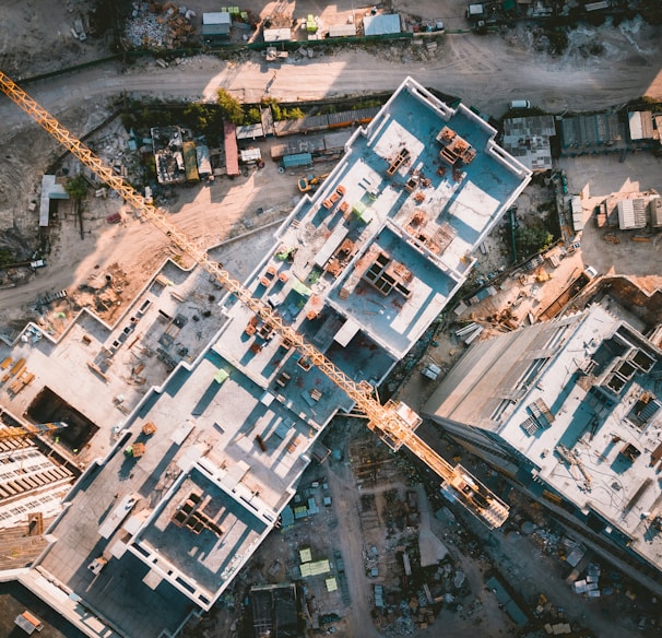 aerial view photography of vehicles and buildings during daytime