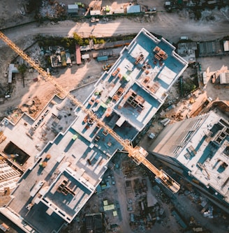 aerial view photography of vehicles and buildings during daytime