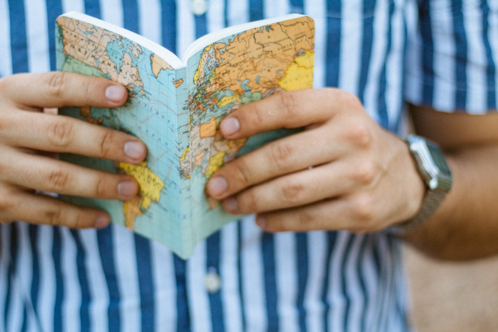 person holding book