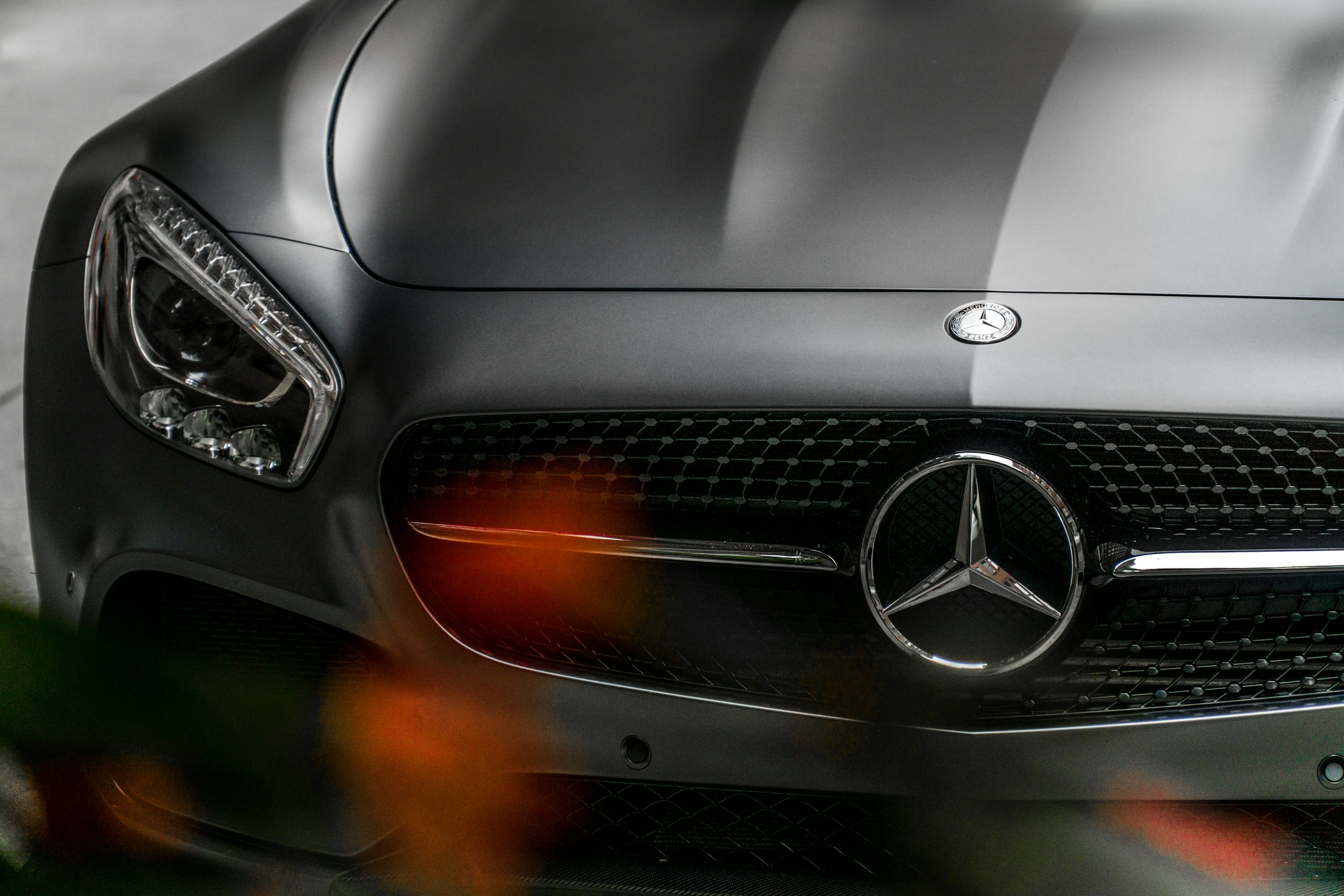 close up photo of Mercedez-Benz vehicle