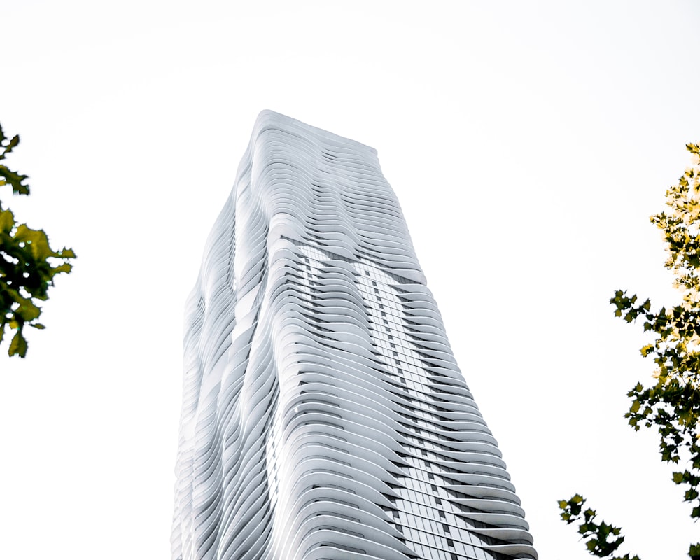 low angle photography of curtain building during daytime