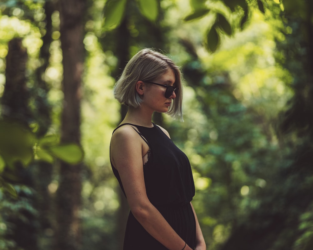 shallow focus photography of woman facing sideways