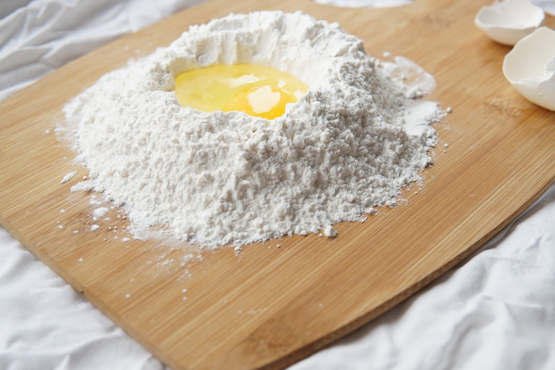 eggs and flour on a wooden board