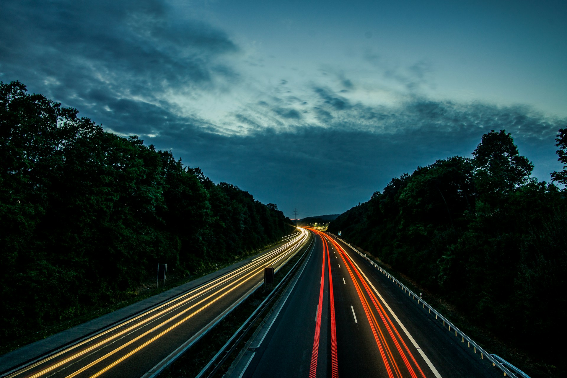 time lapse photography of northbound and southbound lane