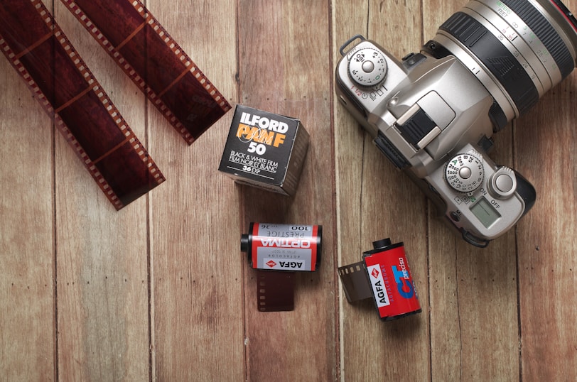 DSLR camera on wooden surface