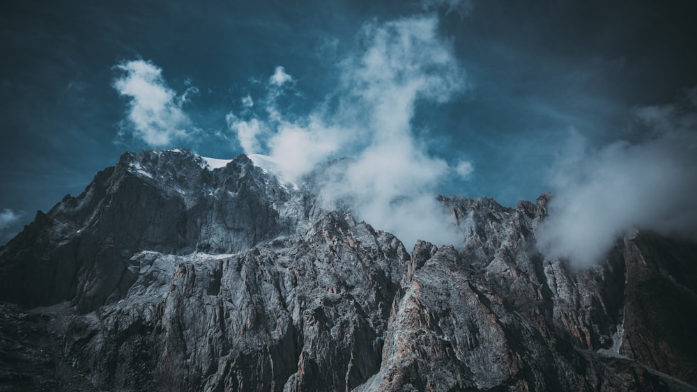 landscape photography of cliff and mountains