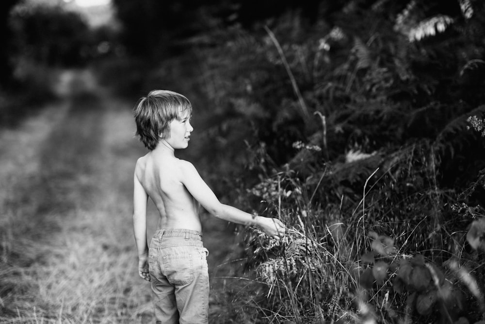 boy walking on the field