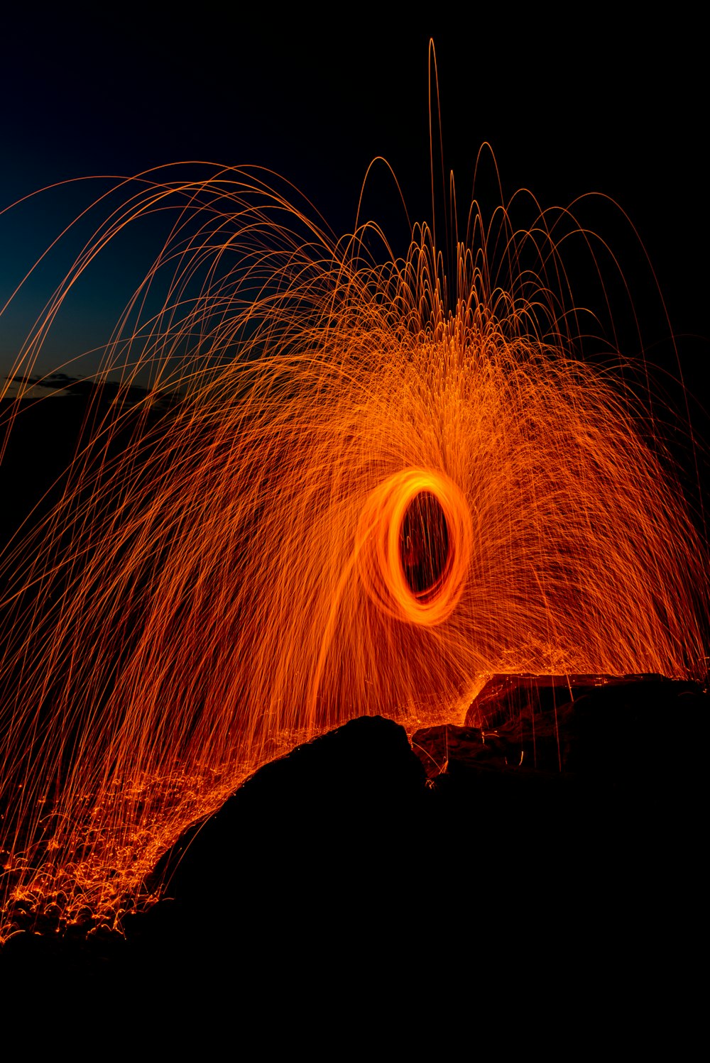 person taking photo of round steel wool