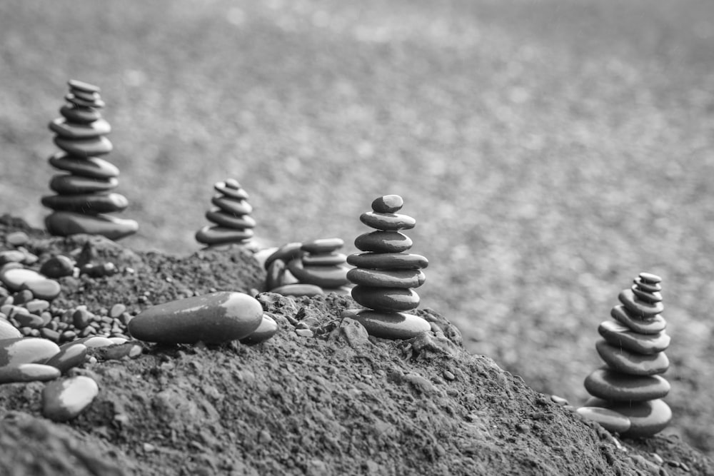 grayscale photo of cairn