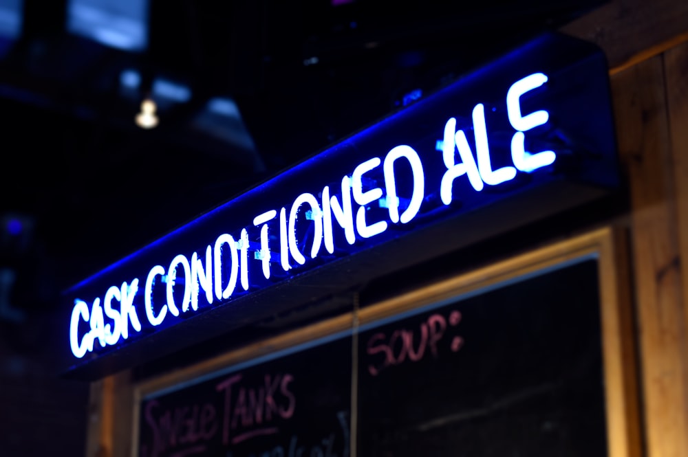 white and blue Cask Conditioned Ale neon signage