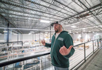 Man talking in a warehouse