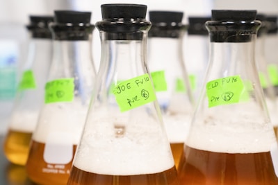 selective focus photography of bottles with lids