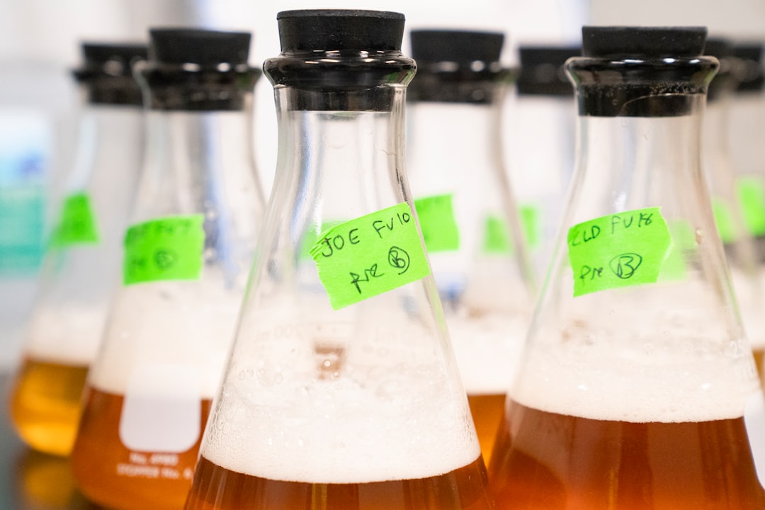 selective focus photography of bottles with lids