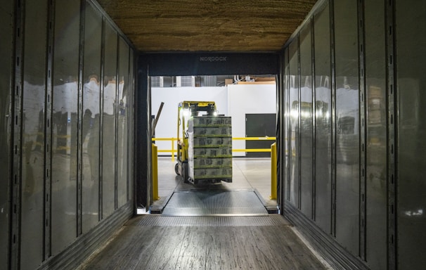 yellow and black forklift during daytime