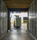 yellow and black forklift during daytime