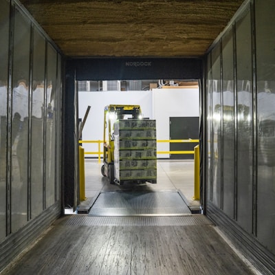 yellow and black forklift during daytime