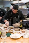 man cooking in kitchen