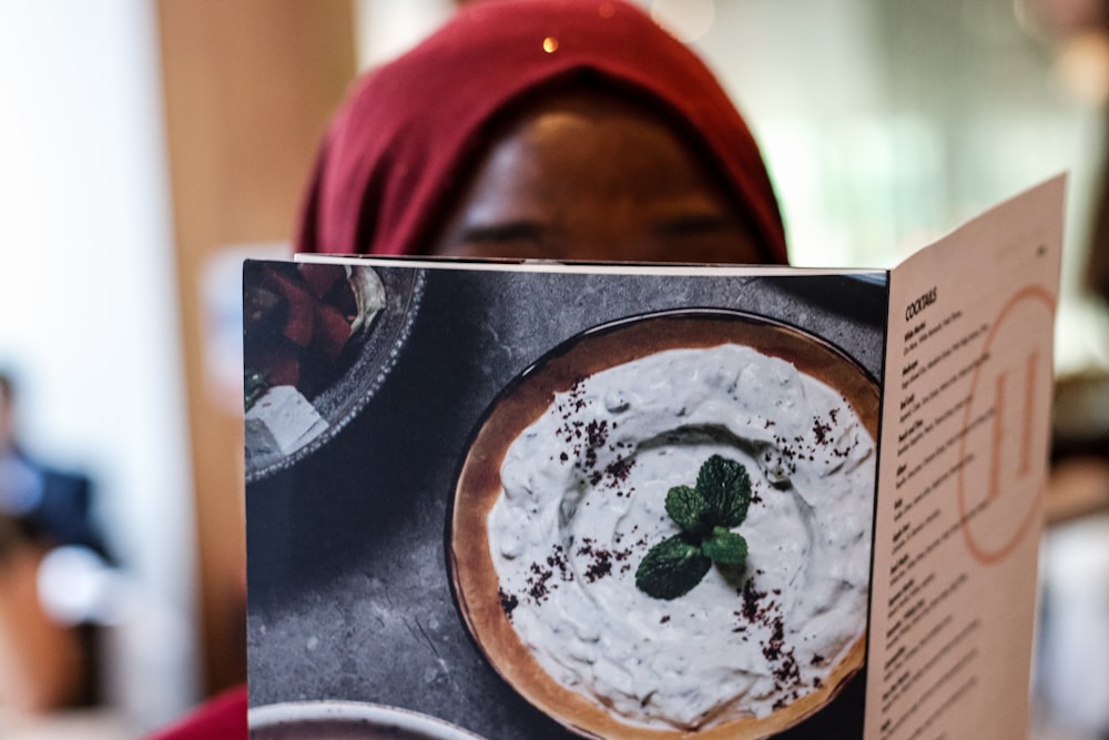 woman reading menu list