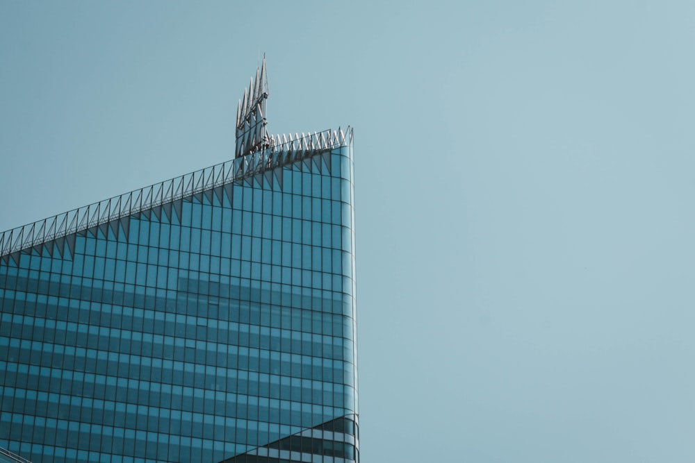 low angle photography of glass curtain building at daytime