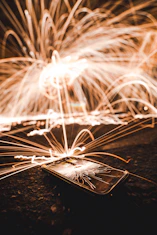 Popular smartphone surrounded by dynamic neon effects and hover animations.