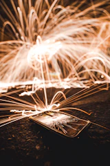 Digital fingerprint pattern glowing over smart device surfaces.